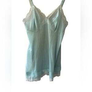 Vintage 50s/60s  women’s short light blue with white lace slip size 34